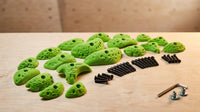 Starter Pack | 51 Premium Plastic Rock Climbing Holds Designed for Beginners | Includes Jugs, Crimps, and Pinches in Multiple Sizes — Lifestyle